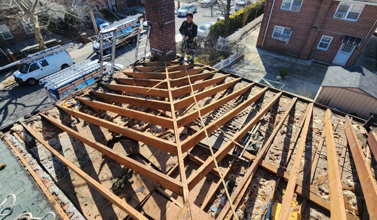 Shingle Roof, New Gutter and New Plywood Installation in Queens Project Shot 5