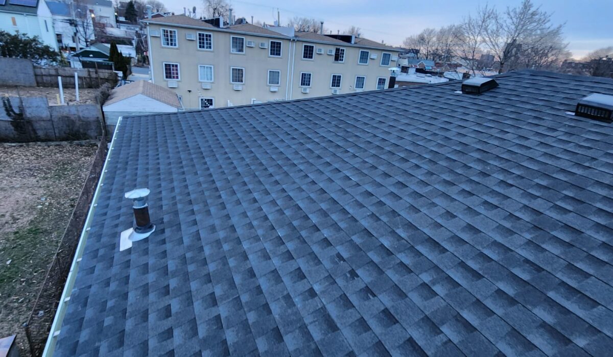 Shingle Roof, New Gutter and New Plywood Installation in Queens Project Shot 9