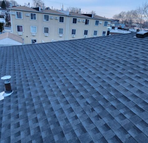 Shingle Roof, New Gutter and New Plywood Installation in Queens Project Shot 9